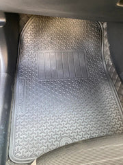Haseen Kia Stonic latex mat – car name embossed in red on driver-side mat