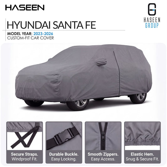 A gray custom-fit car cover shown on a Hyundai Santa Fe, with HASEEN branding and feature callouts along the bottom. The image includes text stating model year 2023-2026 and highlights such as secure straps, durable buckle, smooth zippers, and elastic hem.
