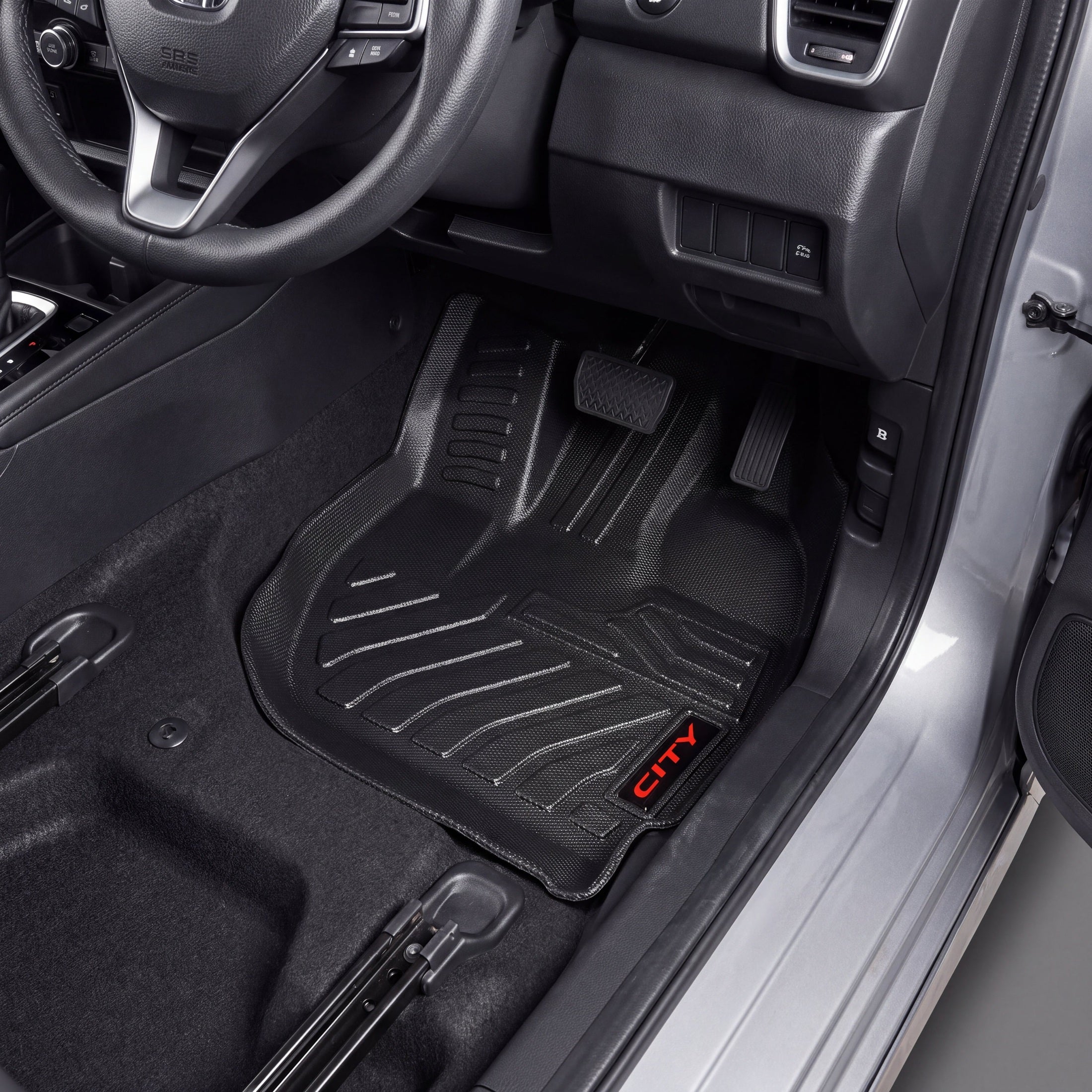Haseen Honda City 2021-2026 9D TPE car floor mats installed – black waterproof mats with red City logo, Pakistan
