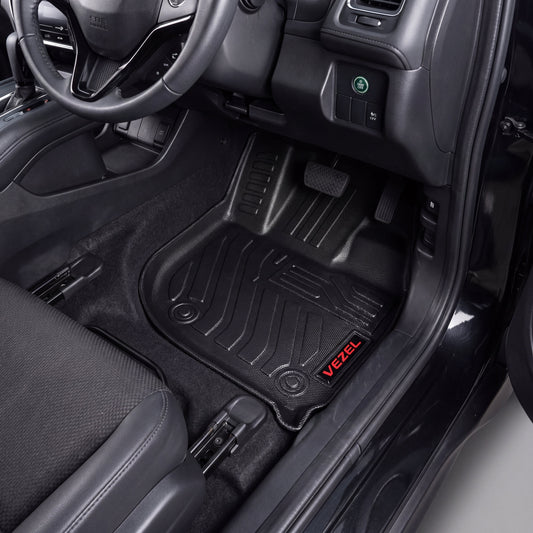 Haseen Honda Vezel 9D TPE car floor mats installed – black ridged mats with red Vezel logo, Pakistan