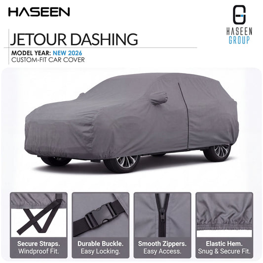 A gray car cover fitted over a car, shown on a white background with HASEEN branding and feature callouts. The image includes text reading 'JETOUR DASHING' and 'MODEL YEAR: NEW 2026 CUSTOM-FIT CAR COVER,' plus four small inset detail panels at the bottom highlighting straps, buckle, zippers, and hem.