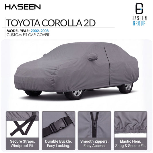 A gray car cover fitted over a Toyota Corolla 2D car, shown on a white background with HASEEN branding and feature callouts for secure straps, durable buckle, smooth zippers, and elastic hem.