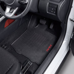 Black car floor mats with a diamond-embossed pattern and a red 'RAIZE' logo, shown installed inside a vehicle's driver's side footwell.