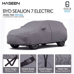 A gray BYD Sealion 7 Electric custom-fit car cover shown on a white background, with HASEEN branding and four feature callout panels at the bottom highlighting secure straps, durable buckle, smooth zippers, and elastic hem.