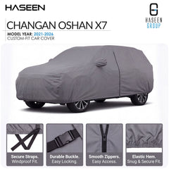 A gray custom-fit car cover shown on a car, with HASEEN branding and text reading 'CHANGAN OSHAN X7' and 'Model Year: 2021-2026'. Four small detail panels at the bottom show secure straps, a durable buckle, smooth zippers, and an elastic hem.