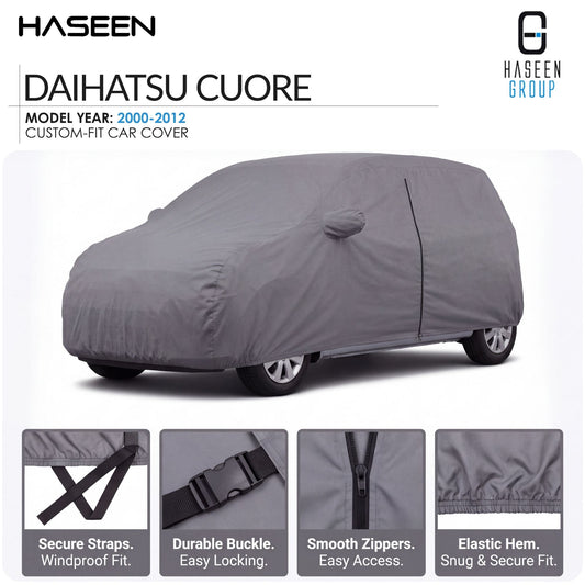 A gray custom-fit car cover shown on a white background, with HASEEN branding and text identifying it as a Daihatsu Cuore model year 2000-2012 cover. Four feature callout panels at the bottom highlight secure straps, durable buckle, smooth zippers, and elastic hem.