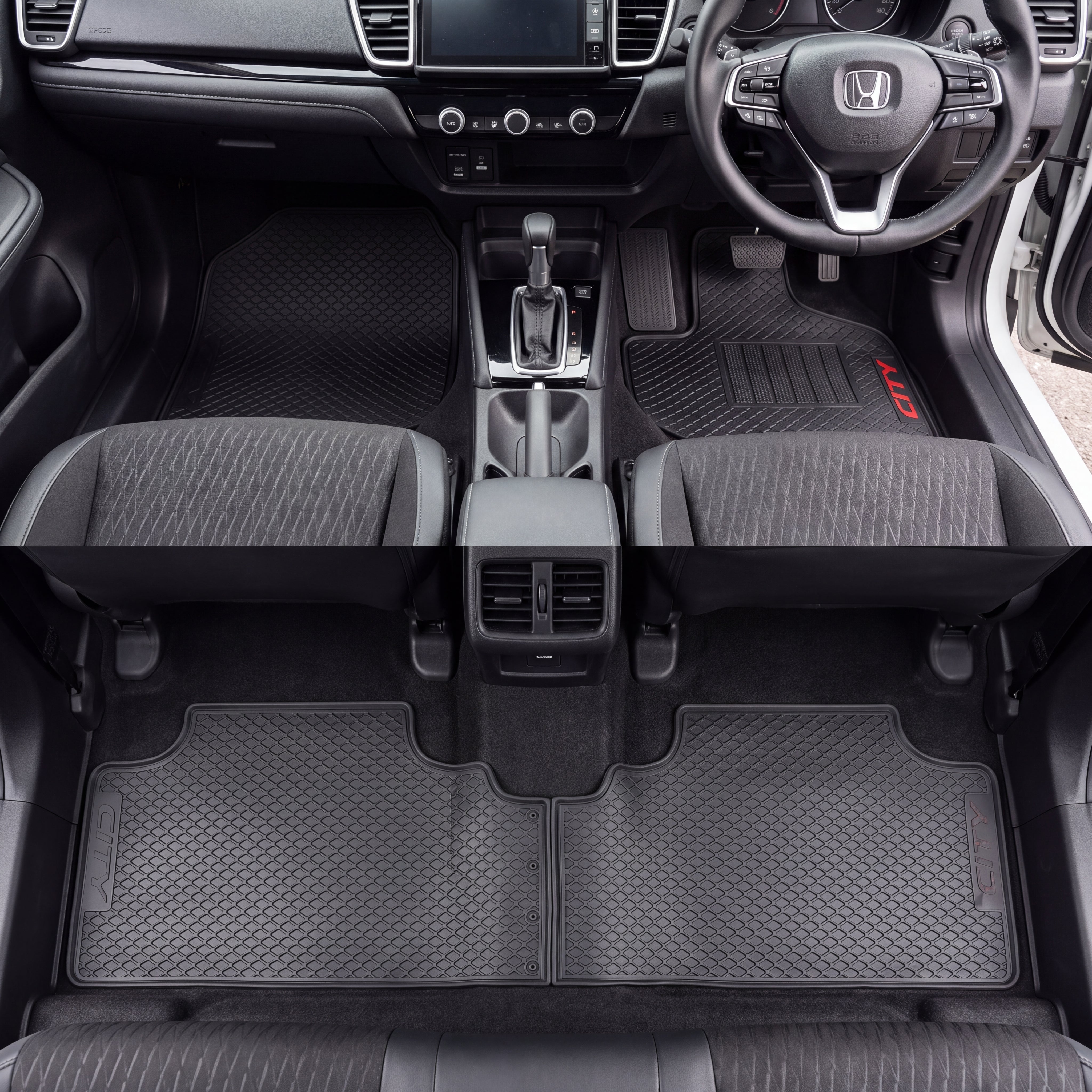 Black textured car floor mats installed in the front and rear of a Honda vehicle interior, shown from above with the seats and dashboard visible.