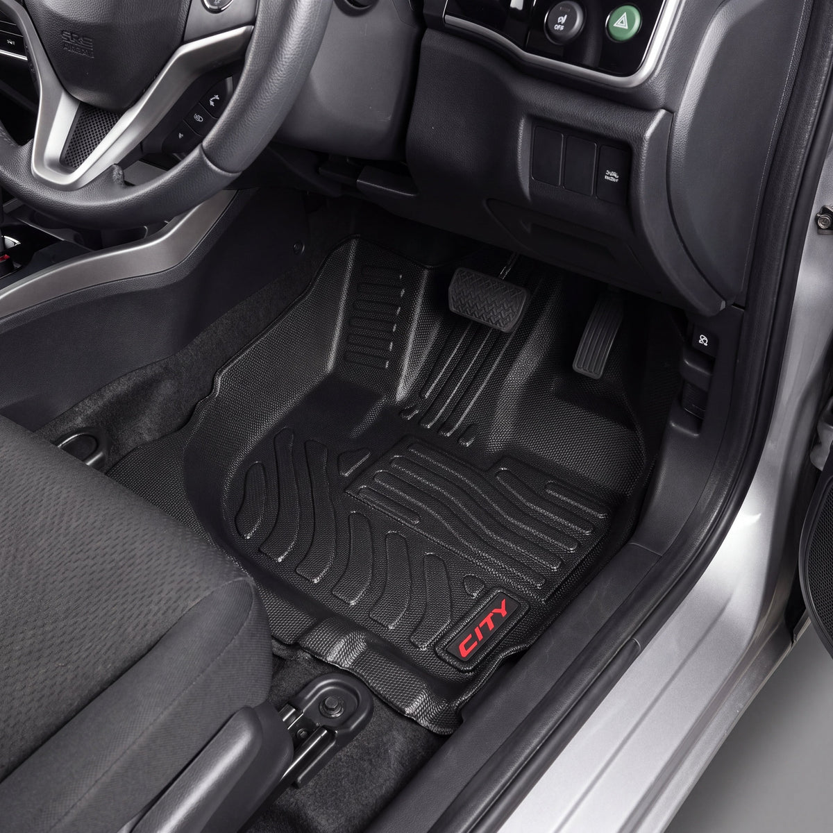 Haseen Honda City 2009-2020 9D TPE car floor mats installed – black heavy duty mats with red City logo, Pakistan