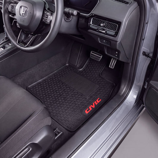 Black rubber car floor mats installed in a Honda Civic, featuring a diamond-embossed pattern and a red embroidered 'CIVIC' logo on the driver's side mat.