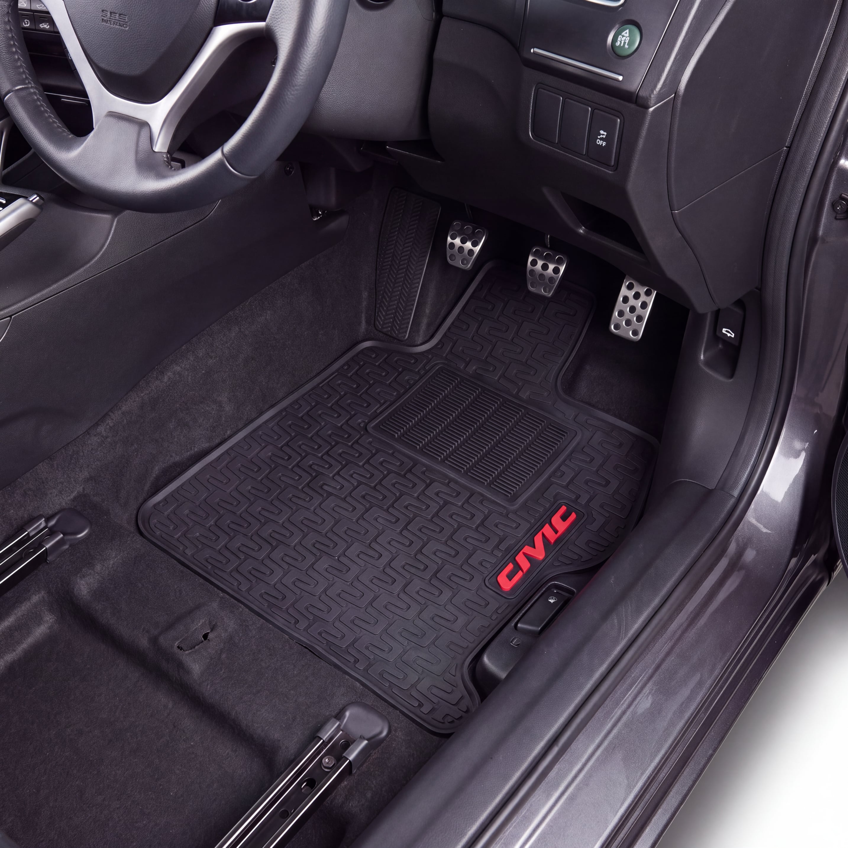 Black car floor mats installed in the driver and passenger footwells of a Honda Civic, with the red 'CIVIC' logo embroidered on the passenger mat.