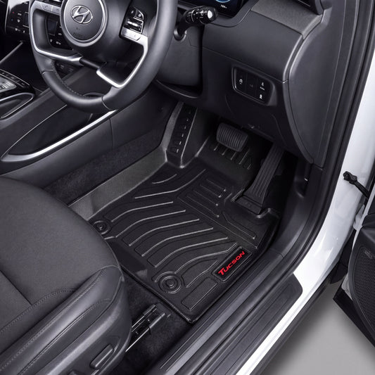 Haseen Hyundai Tucson Hybrid 2025 9D TPE car floor mats installed – black molded mats with red Tucson logo, Pakistan