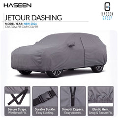 A gray car cover fitted over a car, shown on a white background with HASEEN branding and feature callouts. The image includes text reading 'JETOUR DASHING' and 'MODEL YEAR: NEW 2026 CUSTOM-FIT CAR COVER,' plus four small inset detail panels at the bottom highlighting straps, buckle, zippers, and hem.