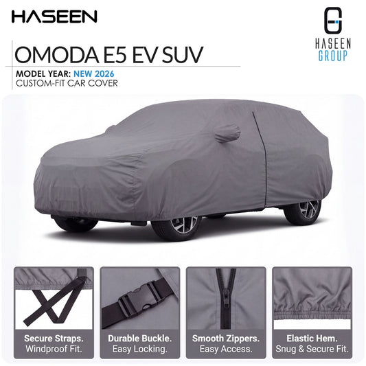 A gray car cover fitted over a vehicle, shown on a white background with HASEEN branding and feature callouts for the OMODA E5 EV SUV. Four inset detail panels at the bottom highlight secure straps, a durable buckle, smooth zippers, and elastic hem.