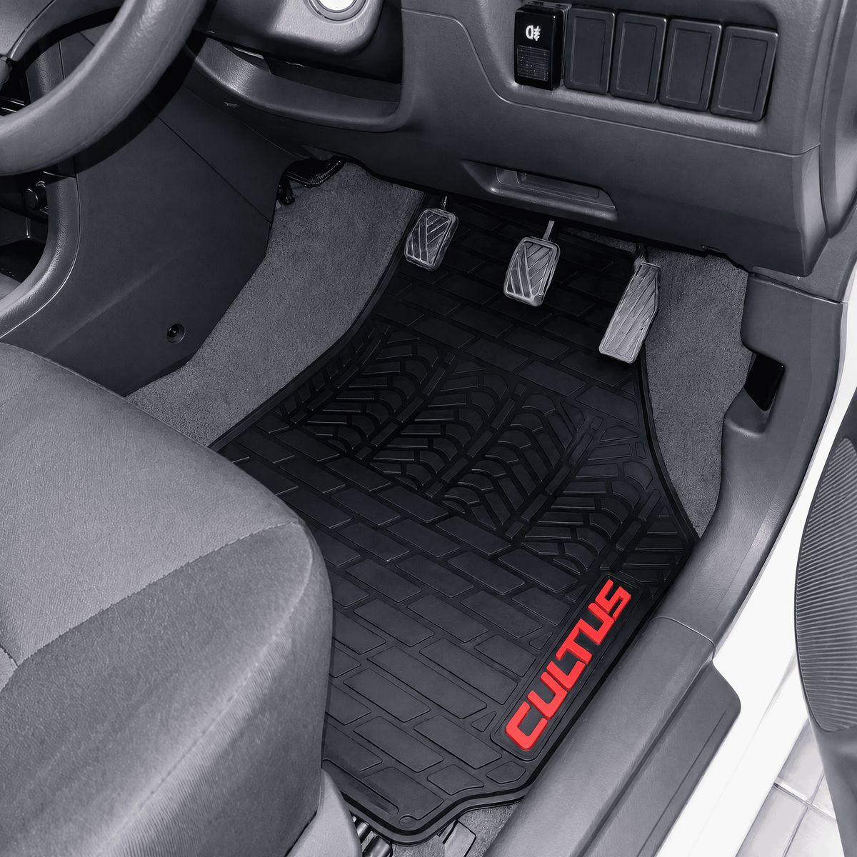 A black textured rubber car floor mat installed in the driver's footwell, with red 'CULOTUS' branding on the lower right corner. The mat is shown inside a vehicle cabin with gray carpet, pedals, and dashboard.