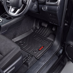 Haseen Toyota Hilux 9D TPE car floor mats installed – black ridged mats with red Hilux logo, Pakistan