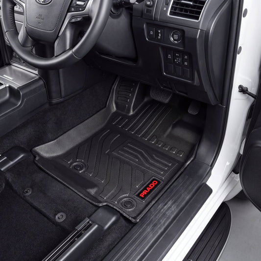 Haseen Toyota Prado 9D TPE car floor mats installed – black mats with red Prado logo in driver footwell, Pakistan