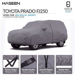 A gray custom-fit car cover shown on a white background, with the text 'TOYOTA PRADO FJ250' and 'HASEEN GROUP' visible. Four small feature callout panels at the bottom highlight secure straps, durable buckle, smooth zippers, and elastic hem.