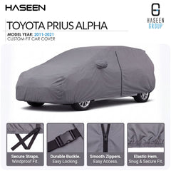 A gray custom-fit car cover shown on a white background, with the text 'TOYOTA PRIUS ALPHA' and 'HASEEN GROUP' at the top, plus four feature close-up panels along the bottom describing secure straps, durable buckle, smooth zippers, and elastic hem.