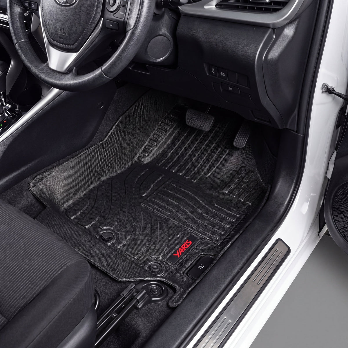 Haseen Toyota Yaris Sedan 9D TPE car floor mats installed – black ribbed waterproof mats, Pakistan